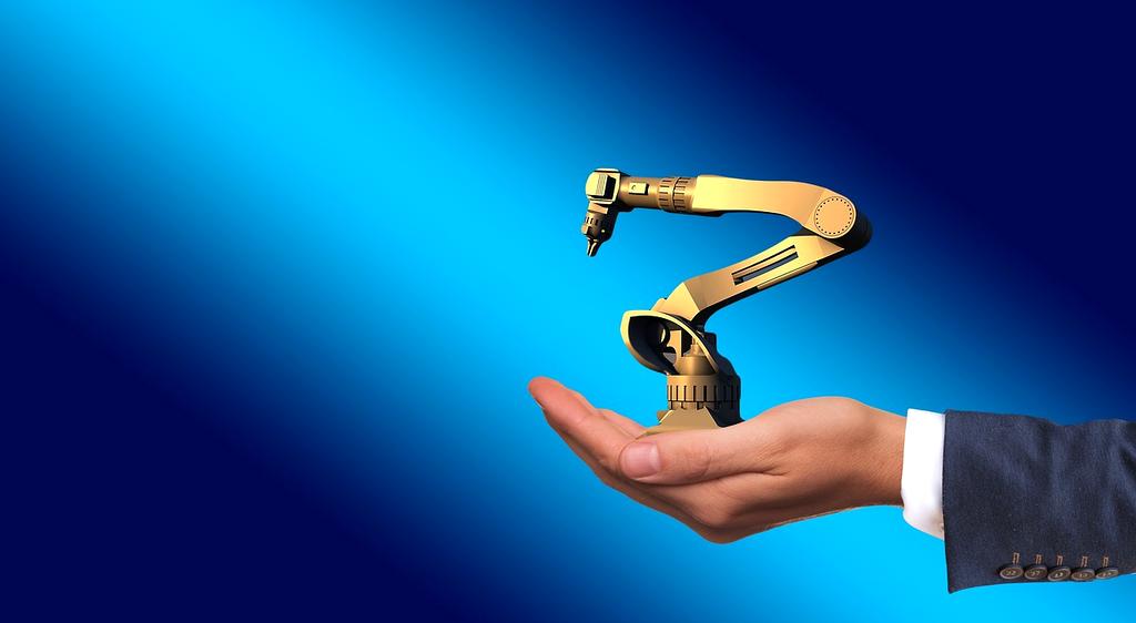 Automation process illustrated by robotic arms and gears