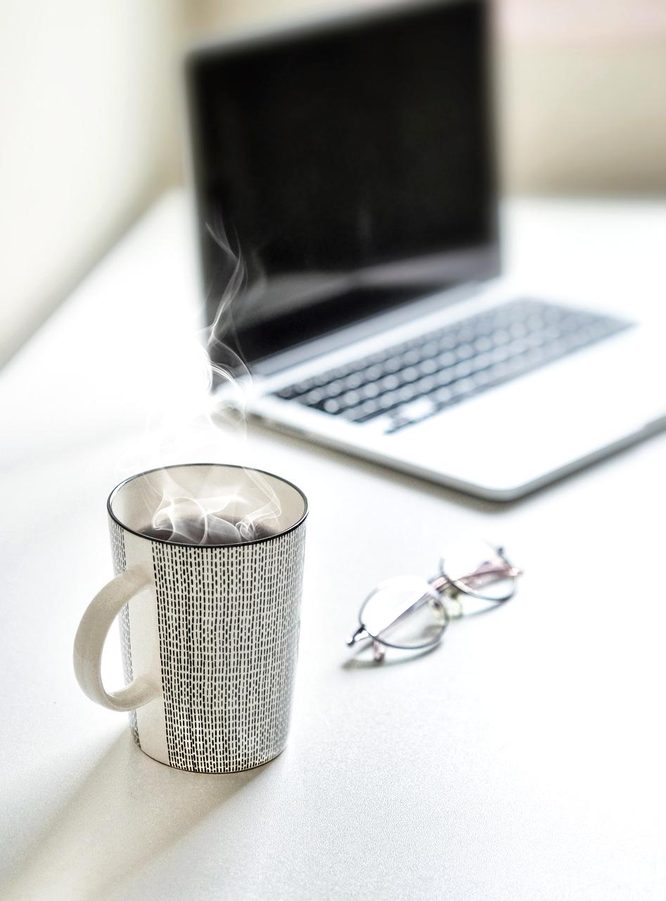 Mobile phone with productivity apps icons on screen